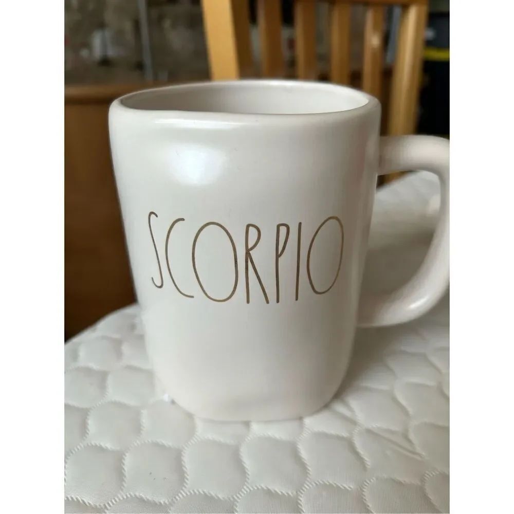Rae Dunn Mug with Scorpio constellation.